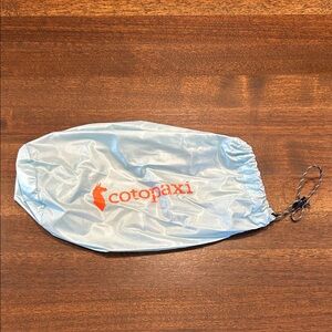 Cotopaxi Pale Blue Packable Stuff Sack with Orange Logo
